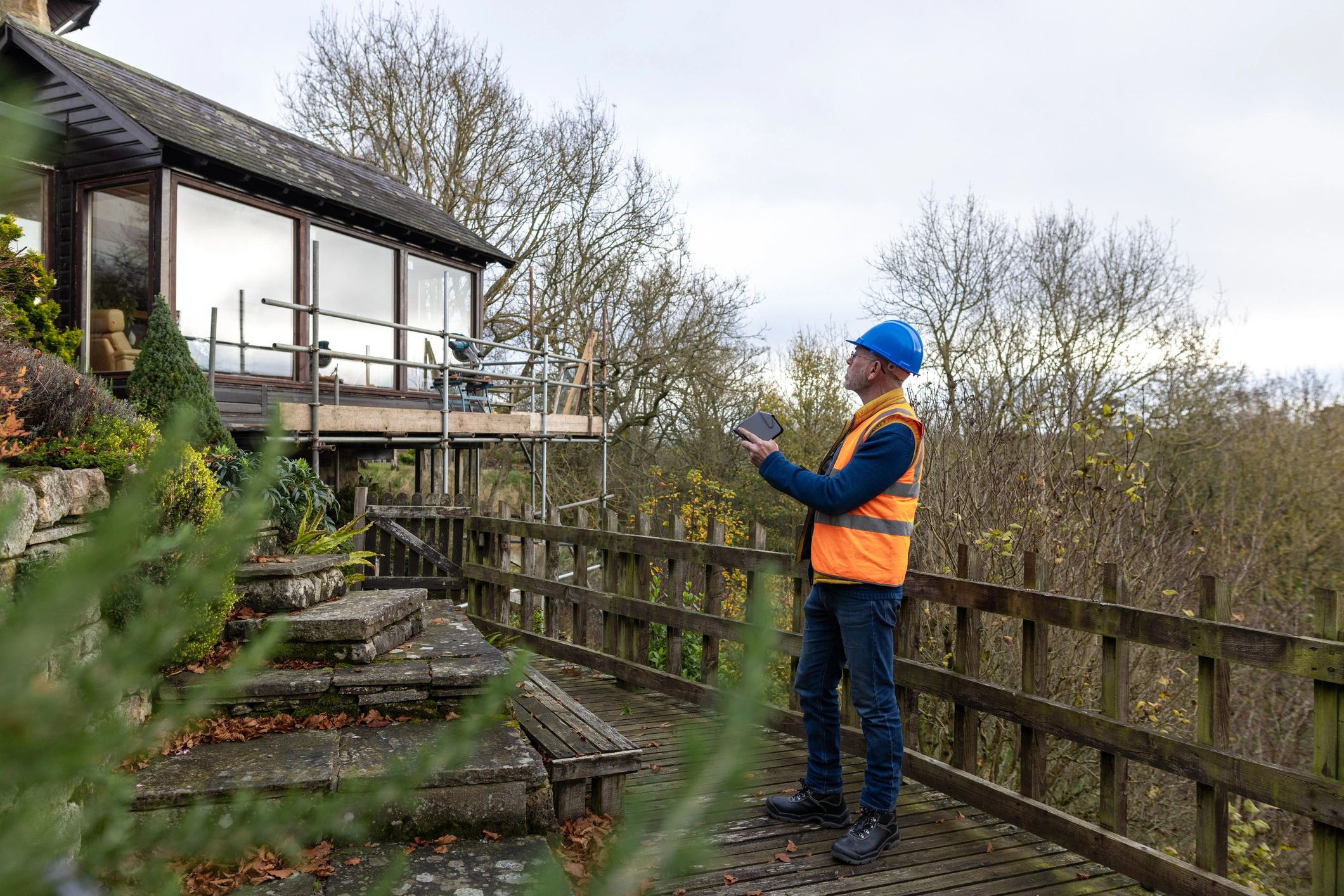 Technician performing security system maintenance